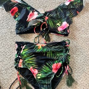 Blushing brunette Hawaiian bikini